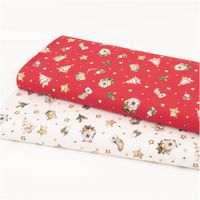 Weihnachtsstoff Baumwollstoff Popeline Allover Weihnachtsmotive rot 1,45m Breite Zwei gefaltete Stoffe mit weihnachtlichem Muster in Rot und Weiß