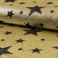 Paillettenstoff Sterne gold schwarz Goldfarbener Paillettenstoff auf Mesh-Tüll mit schwarzen Sternen in unterschiedlichen Größen.
