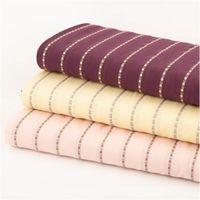 Baumwollstoff Dobby Blümchenstreifen bordeaux 1,42m Breite drei aufeinanderliegende Stoffballen aus Dobby-Baumwolle mit Blümchenstreifen in verschiedenen Farben