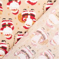 Weihnachtsstoff Baumwollstoff Joel Weihnachtsmänner beige rot 1,40m Breite Vorder- und Rückseite eines beigen Baumwollstoffs mit roten Weihnachtsmann-Motiven, Stoffkante sichtbar
