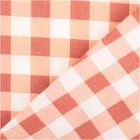 zwei Lagen Baumwollstoff mit Vichy Karo in Rot, Apricot und Weiß locker übereinandergelegt