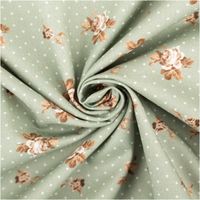 Baumwollstoff Trachtenstoff Classic Rosen Punkte klein lindgrün feinfädig und seidig glatt 1,40m Breite Drapierter Baumwollstoff mit Rosenmuster in Beige auf gruener Basis, Nahaufnahme der Textur.