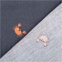 Musselin Stoff Krebse marineblau 1,50m Breite Musselin Stoff Krebse marineblau: Vorderseite und hellere Rückseite im Vergleich