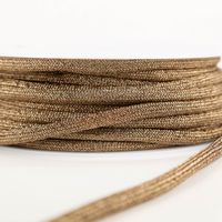 Kordel Kettengeflecht flach Metallic messing 8mm Breite flach gelegte messingfarbene Kordel mit Metallstruktur eng auf Rolle gewickelt