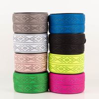 Gummiband Glitzer Rauten geometrisch himbeere pink silber 4cm Breite acht Rollen elastisches Band in verschiedenen Farben mit silbernem Rautenmuster gestapelt