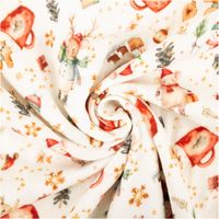 Detailaufnahme eines Weihnachtsstoffes mit winterlichen Motiven in Rot und Gruen auf cremefarbenem Hintergrund.