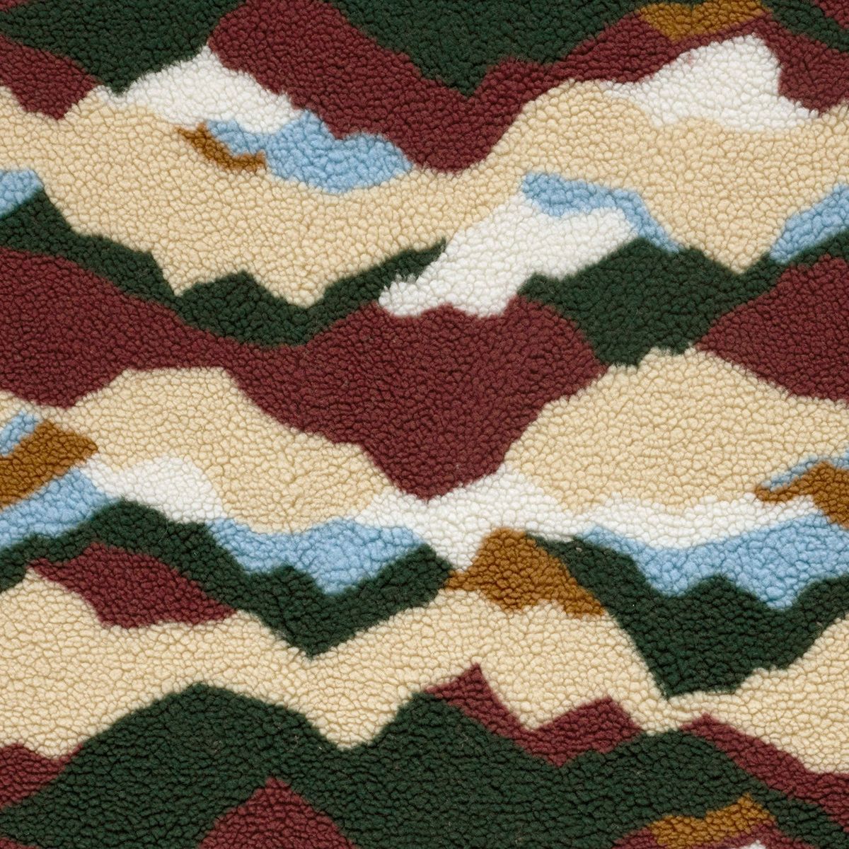 Sherpa Fleece mit abstrakten Wellen in Grün, Hellblau und Creme flach liegend, M Sherpa Fleece mit abstrakten Wellen in Grün, Hellblau und Creme flach liegend, Musterrapport auf bordeauxrot