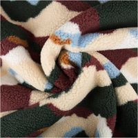 Teddy Stoff Sherpa Fleece abstrakte Wellen bordeauxrot bunt 1,50m Breite Sherpa Fleece Stoff abstrakte Muster in bordeauxrot, creme, grün und hellblau zur Spirale gelegt