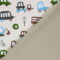 Umgeschlagene Ecke zeigt die weiche Fleece-Innenseite des Softshells mit Autos, Umgeschlagene Ecke zeigt die weiche Fleece-Innenseite des Softshells mit Autos, Baggern und Bussen