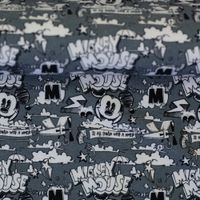 Jersey Stoff Baumwolljersey Disney Mickey Mouse Comic grau meliert schwarz weiß Graumelierter Baumwolljersey mit Mickey Mouse Comic-Motiven in Schwarz und Weiß, aufgerollt als Stoffballen