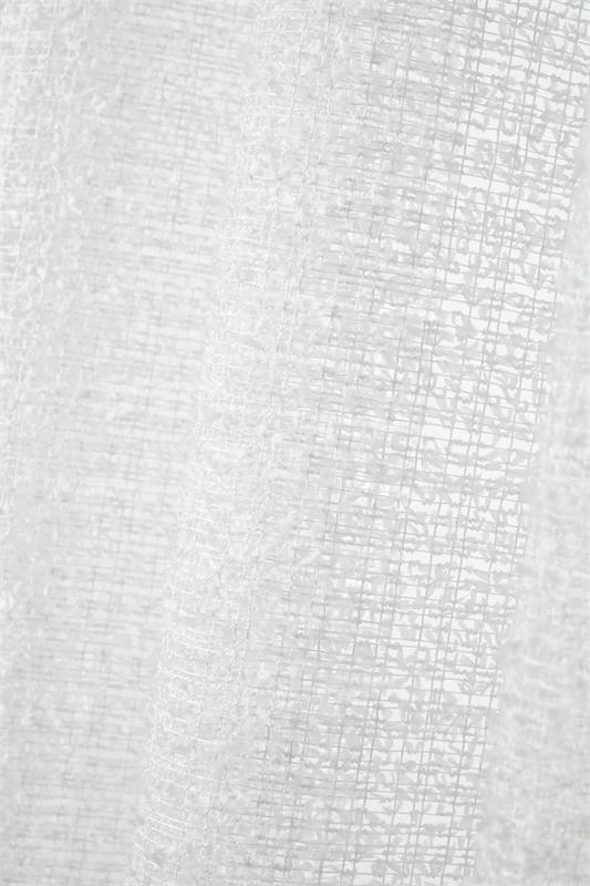Vorhang Ösenvorhang transparent Strukturvoile uni weiß 140x240cm Detailansicht des transparenten Voile in Weiß mit sichtbarer Struktur im Gegenlicht