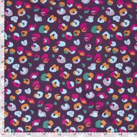 French Terry Stoff Leomuster aubergine pink orange French Terry Stoff mit buntem Leomuster in Pink, Orange und Hellblau auf Aubergine flach mit Maßband zur Größe des Musters