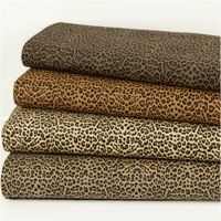 Jeansstoff Stretch Leo Leomuster khaki schwarz 1,5m Breite Stoffstapel mit elastischem Jeansmaterial in unterschiedlichen Brauntönen und schwarzem Leopardenmuster