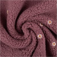 Teddystoff Meterware bestickt Gänseblümchen rosenholz 1,45m Breite Teddystoff in rosenholz zur Spirale gelegt mit weißen gestickten Gänseblümchen-Motiven