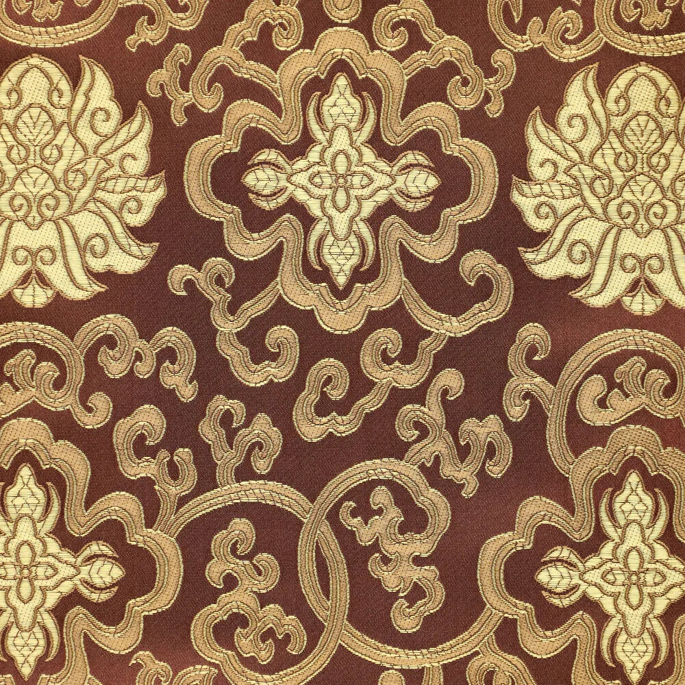 Brokatstoff dunkelbraun gold in Nahaufnahme – eingewebte Ornamente und Ranken im Detail