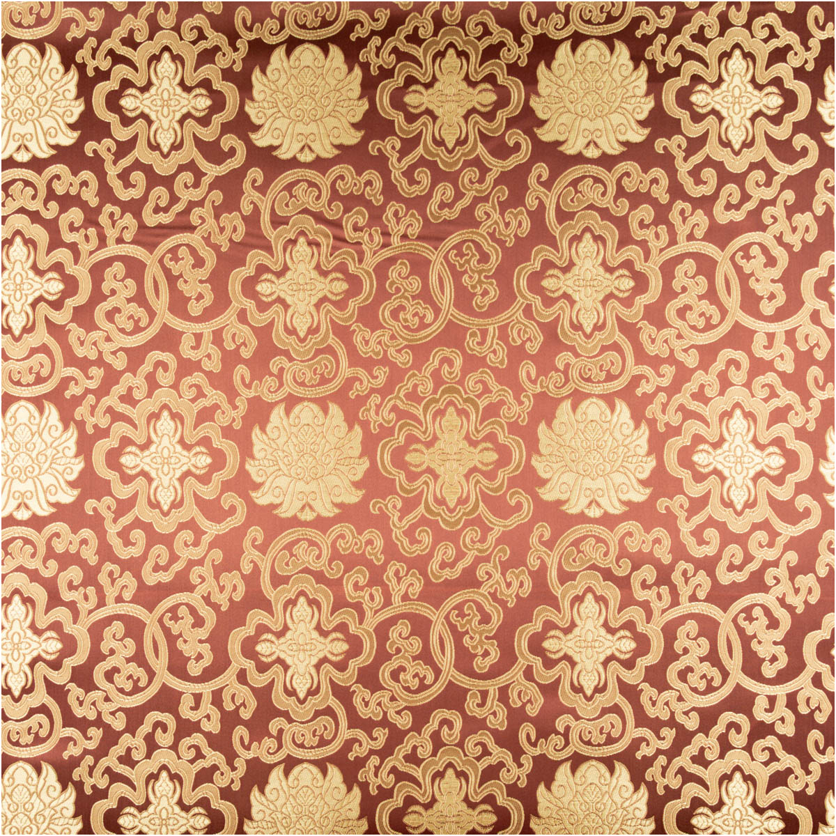 Nahaufnahme von Brokat Jacquardstoff in dunkelbraun mit goldenen Ornamenten im klassischen Muster
