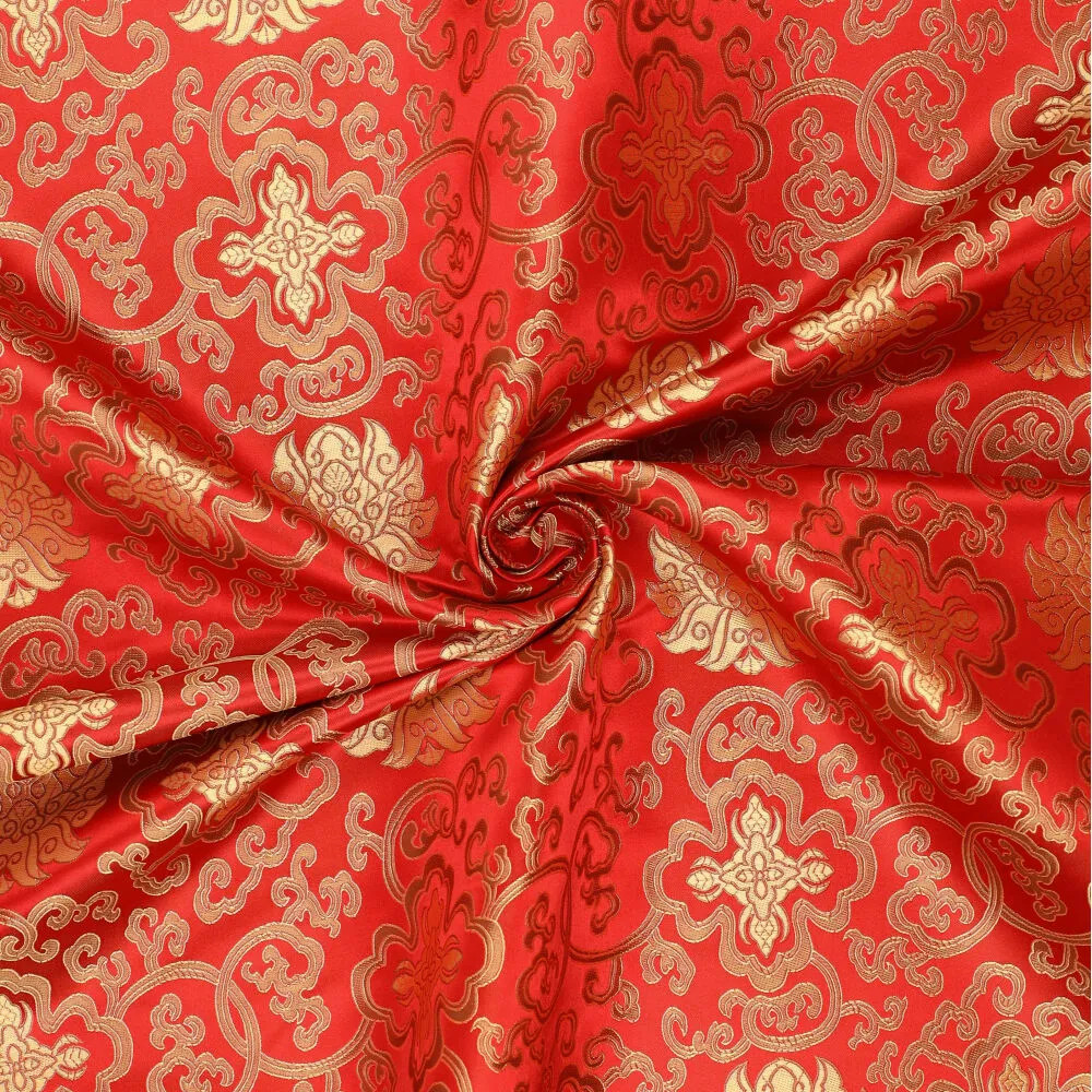 Brokat Jacquardstoff rot gold drapiert – edler Glanz des eingewebten Musters Brokat Jacquardstoff rot gold drapiert – edler Glanz des eingewebten Musters
