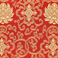 Brokatstoff rot gold in Nahaufnahme – eingewebte Ornamente und Ranken im Detail Brokatstoff rot gold in Nahaufnahme – eingewebte Ornamente und Ranken im Detail