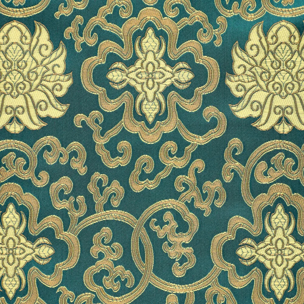 Brokatstoff petrol gold in Nahaufnahme – eingewebte Ornamente und Ranken im Detail Brokatstoff petrol gold in Nahaufnahme – eingewebte Ornamente und Ranken im Detail
