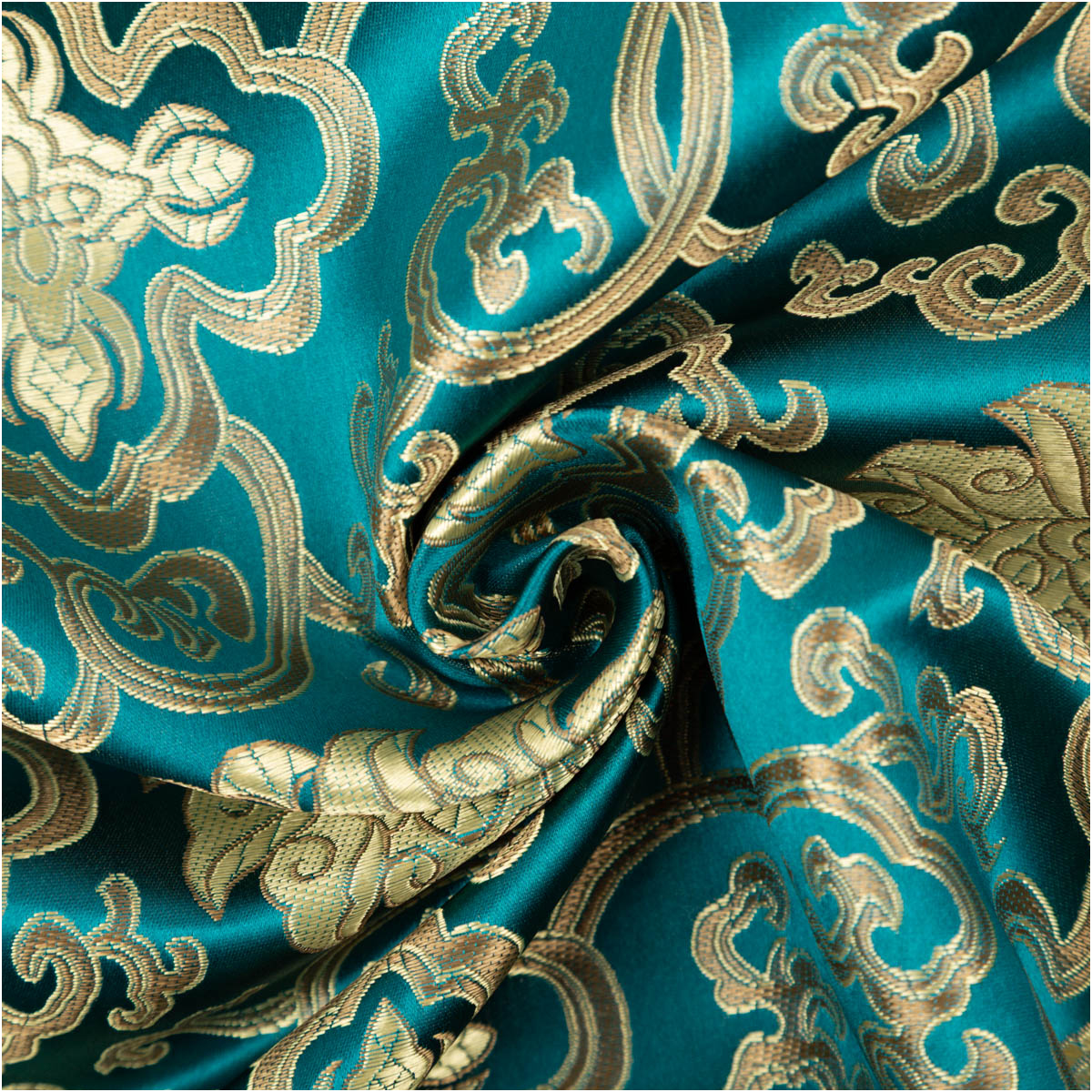 Jacquardstoff Brokat Ornamente petrol gold 1,50m Breite Jacquardstoff in Petrol mit goldfarbenen Ornamenten, dekorativ zur Spirale gelegt