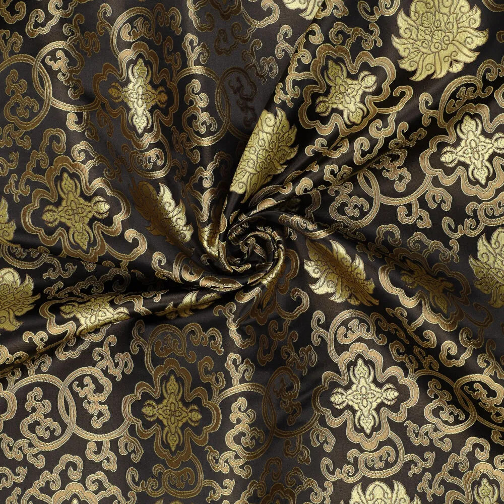 Brokat Jacquardstoff schwarz gold drapiert – edler Glanz des eingewebten Musters