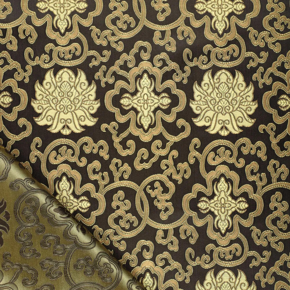 Jacquardstoff Brokat schwarz gold – Glanz und Struktur der Ornamente im Licht