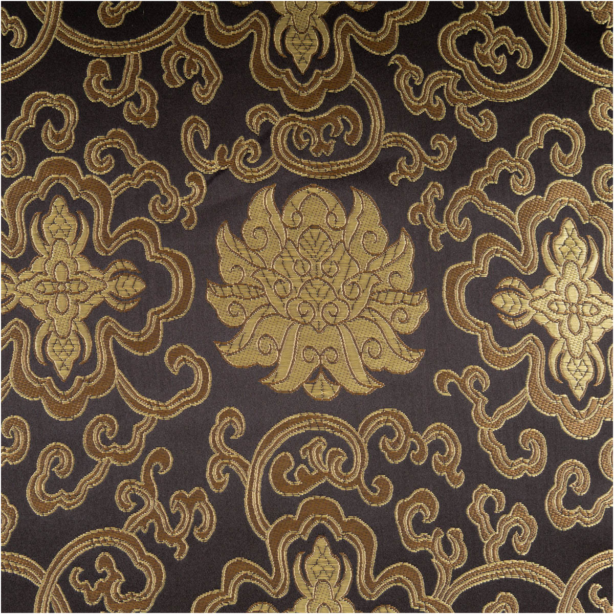 Brokatstoff mit aufwendigem Ornamentmotiv in Gold auf dunklem Hintergrund, Stoffmuster im Detail
