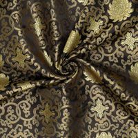 Brokat Jacquardstoff schwarz gold drapiert – edler Glanz des eingewebten Musters