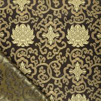 Jacquardstoff Brokat schwarz gold – Glanz und Struktur der Ornamente im Licht