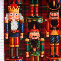 Baumwolljersey mit Nussknacker-Figuren und kariertem Muster in Rot und Grün, detaillierte Nahaufnahme