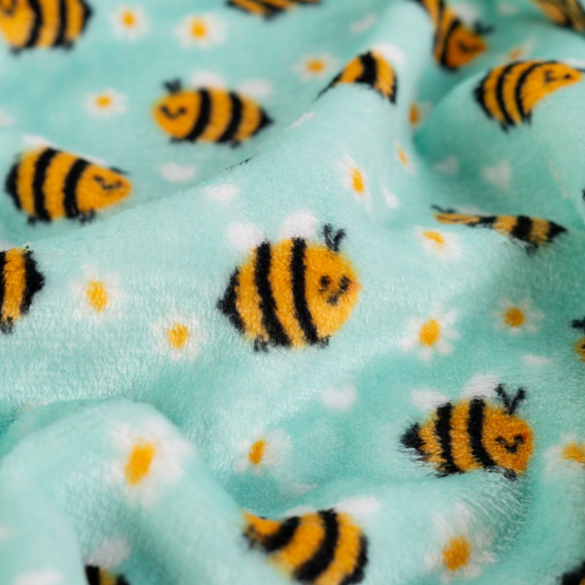 Fleece Stoff mit Bienen und Gänseblümchen auf Mint – Polarfleece Digitaldruck 155 cm, Nahaufnahme