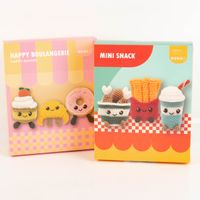 Häkelset Pommes Hähnchenkeule und Milchshake DIY Set Verpackung mit Mini Snack Häkelset, vorne abgebildet bunte Figuren aus Pommes, Hähnchenkeule und Milchshake