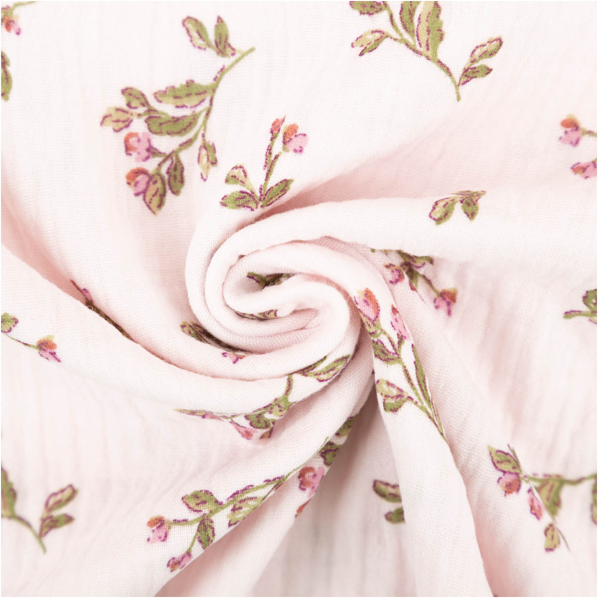Musselin Stoff Baumwolle bedruckt Souella Blütenzweige zartrosa grün 1,30m Breite Musselin Stoff in zartrosa mit grünen Blütenzweigen, mittig zur Spirale gedreht, florales Design