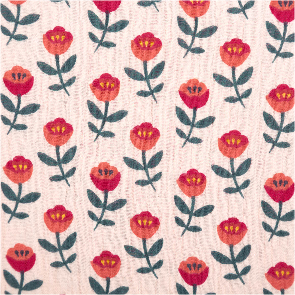 Musselin aus Baumwolle mit rosa Hintergrund, bedruckt mit stilisierten roten Blüten und grünen Blättern