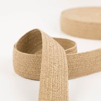 Gurtband elastisch Jute-Optik dunkelbraun 4cm zur Schlaufe gelegt vor der Rolle, elastisches Band
