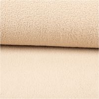 Teddystoff Kunstfell Sherpa uni sand 1,55m Breite beiger Sherpa Kunstfell Stoff als Rolle, Nahaufnahme der Oberfläche mit flauschiger Struktur