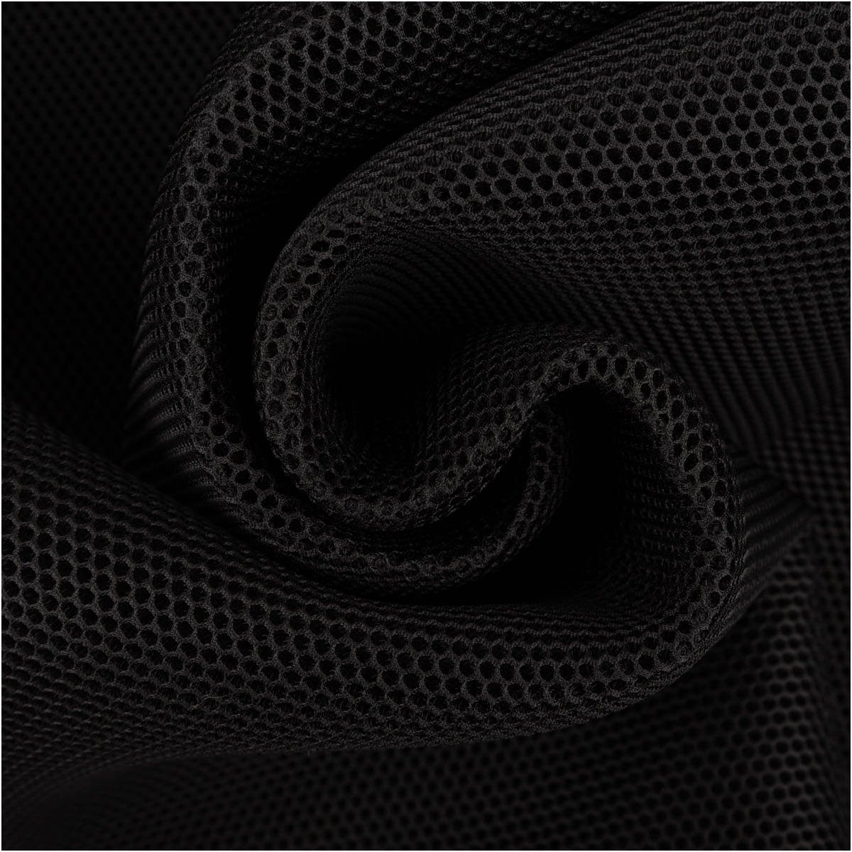 Mesh Stoff 3D Wabenstruktur Martindale 30.000 schwarz 150cm Stoffbreite schwarzer 3D Mesh Stoff mit wabenartiger Struktur zur Spirale gelegt